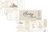 The Honey & Heart ephemera pack - kraft-toned tags, labels, banners and balloon pieces printed with soft bear illustrations and friendship phrases, arranged around the Honey & Heart label card.