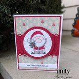 A stamped card showcasing a chubby, cheerful cartoon Santa holding pine sprigs from Unity Stamp Co's A Little Ho Ho Ho red rubber stamp set, with the sentiment 'Have a holly jolly everything!'.