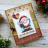 A handmade card featuring a chubby, cheerful cartoon Santa holding pine sprigs from Unity Stamp Co's A Little Ho Ho Ho red rubber stamp set, with the sentiment 'Special delivery from the North Pole'.