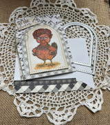 Arched card with the hen in warm brown on a gingham panel over a lace doily, with the not today, cluckers sentiment at the top.