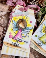 Watercolour tags in yellow and pink with the fairy in a pink dress; the close-your-eyes-and-make-a-wish wording is from another set.