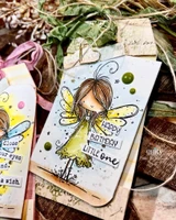 Layered tags with the fairy in yellow and green dresses; the happy-birthday-little-one wording is from another set.