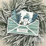 Card with the snowman in a blue hat popping from an envelope in a frosted wreath, 'Smiling so big, I loved your gift.'