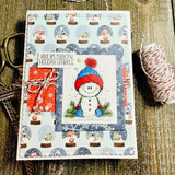 Card with the snowman in a red-and-blue hat framed over a snow-globe print, 'Your gift made my holiday sparkle.'