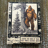 Black and cream vintage-style card with the Sasquatch and pine stamped in monochrome and 'You're the kind of man they write legends about.'