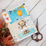 Card of the teddy with an orange balloon and pennants with "It's a beary special day."