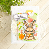 Card with the grumpy bunny among spring flowers and 'Ok, fine. Happy Easter.'
