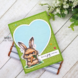 Green card with the grumpy bunny in a heart and 'Spring joy loading...'