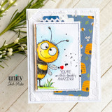 A handmade greeting card with a wide-eyed, smiling cartoon bumblebee from Unity Stamp Co's Peek-A-Bee red rubber stamp set, with the sentiment 'Hey honey'.