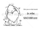 Line-art stamp of a floppy-eared bunny hugging a big heart with sentiments 'be mine,' 'somebunny cares' and 'I like you a whole bunch.'