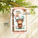 A handmade card featuring a shaggy Highland cow with a little bird perched on its head, in a wildflower meadow from Unity Stamp Co's Seen & Herd red rubber stamp set, with the sentiment 'Heard you were having a day, we are here for you'.