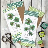 Two slim bookmark-style cards on green polka dot and floral papers, each with a trio of stamped clovers and a narrow sentiment reading So very lucky to know you.