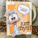 A wild-eyed quirky bird hand-stamped on a card and lettered "You're my kind of weird."