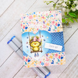 Floral-and-blue card of the swinging bird with 'chirp up!' sentiment tag.
