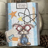 A handmade card featuring a nerdy bunny in big round glasses and denim overalls, surrounded by books from Unity Stamp Co's Clever Cottontail red rubber stamp set, with the sentiment 'You have big brain energy'.