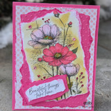 Pink card with the cosmos and poppies in purple and pink and 'Beautiful things take time.'