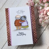 Tall card of the embracing couple with "The best love stories never end" and "Happy Anniversary."