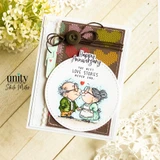 Two circle cards of the embracing and kissing couple with a plaid strip and "Happy Anniversary."