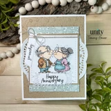 Card of the kissing couple over soft blue with "Happy Anniversary."