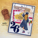 Handmade graduation card featuring a girl in cap and gown holding a diploma and bouquet with layered collage background and “26” number accent