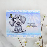 Soft blue card with the puppy and butterflies under a sunburst, 'Just when you need it most... hope appears.'