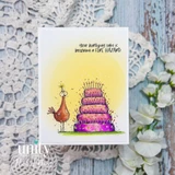 Funny birthday card with bird, candle-filled cake, and “fire hazard” message.