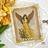 Handmade card featuring a graceful angel with outstretched wings and halo, dressed in flowing golden robes among florals, with a vintage-style background and the sentiment “Blessings.”