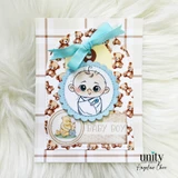 Baby boy card with swaddled baby, teddy bears, and blue bow.