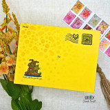 Yellow envelope with dog and cat stamp and “just fur you” sentiment.