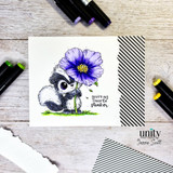 Clean skunk card with purple flower and “favorite stinker” sentiment.