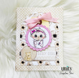 Baby girl card with pink bow, baby illustration, and teddy bear accent.