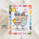 Bright summer card with two stylish women in swimsuits, a flamingo embellishment, and the sentiment “Too fabulous to behave.”