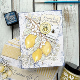 Handmade thank-you card with layered lemons, citrus blossoms, vintage bee accents, and soft blue botanical background.