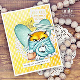 Funny card with a grumpy cat wrapped in a teal blanket holding a mug, paired with the sentiment “Pretty sure you’re fakin’ it.”