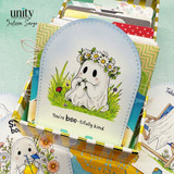 Ghost-themed pocket card with a daisy flower crown and the sentiment “You’re boo-tifully kind,” displayed in a striped organizer box.