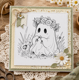 Square card with a flower-crowned ghost surrounded by wildflowers and rustic layered embellishments.