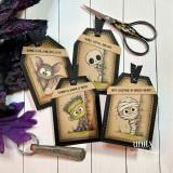Set of four Halloween coffin-shaped tags featuring a bat, skeleton, Frankenstein, and mummy with playful spooky sentiments.