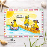 Beach-themed card with three playful geese swimming, snorkeling, and building a sandcastle beneath the sentiment, “Soak Up the Sunshine!”