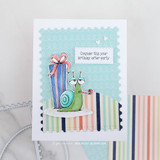 Belated-birthday card with a smiling snail beside a tall wrapped gift, over the sentiment 'Consider this your birthday after-party.'