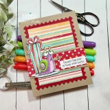 Kraft card with a red scalloped frame over rainbow striped paper, a party-hatted snail beside a tall stack of wrapped gifts, and a small sentiment reading Consider this your birthday after-party.