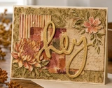 Vintage collage card with the word hey die cut in gold, layered over striped and handwriting print papers with a rust chrysanthemum and pale pink blooms.