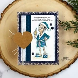 Joy Pending card from Unity Stamp Co: Artie in a blue nightcap, teal robe and blue reindeer slippers on navy plaid and woven papers with a kraft heart tag, under "Hope Santa brings you something better than another list of things to do."