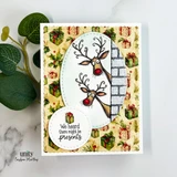 Christmas gift paper card with a mint oval: the two reindeer with red noses peering around a gray brick wall, sentiment circle 'We heard there might be presents.'