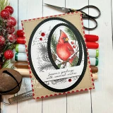 Stillness and Song, October 2026 Background of the Month sample card: the cardinal in a black stitched oval on kraft with Season's greetings with warmest wishes