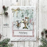 Christmas card with The Little Cardmakers mouse in a brown scarf mailing a letter at a snowy red-flag mailbox, framed by pine and silver ornament papers with a gold bow, sentiment 'Handmade happiness headed your way.'