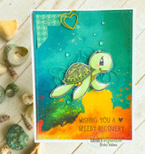 Card with the turtle swimming on a teal-and-orange ocean background, 'Wishing you a speedy recovery.'