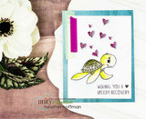 Card with a yellow turtle and small hearts on teal, 'Wishing you a speedy recovery.'
