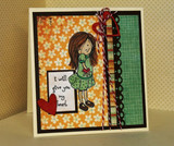 Card with the girl in a green dress on orange floral paper, with 'i will give you my heart' on a white panel, a red heart and red and white twine.