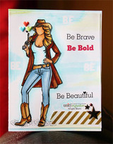 The cowgirl colored in a brown coat, jeans and boots on a soft watercolor-sky card, reading 'Be Brave', 'Be Bold' and 'Be Beautiful.'