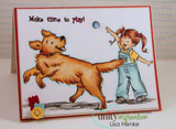 Card with the girl in blue overalls and a yellow shirt tossing a blue ball to a leaping golden retriever colored in warm browns, red border, sentiment 'Make time to play!'.